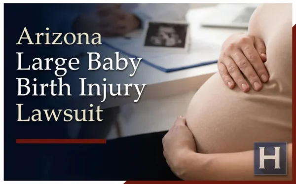 A pregnant woman holds her belly, reflecting the possible situations an Arizona Large Baby Birth Injury lawyer may investigate concerning medical care.