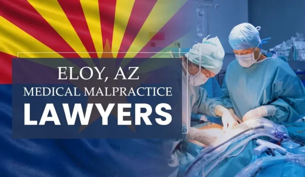 La bandera del Estado de Arizona se mezcla en un entorno sanitario en Eloy donde se ha producido una negligencia médica, lo que representa la necesidad de Abogados de Negligencia Médica para ayudar a los pacientes perjudicados por los profesionales médicos y centros de salud.