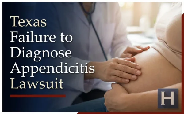 A medical professional gently examines a pregnant person's abdomen, reflecting the sensitive care involved in a Texas Failure to Diagnose Appendicitis lawyer's work.