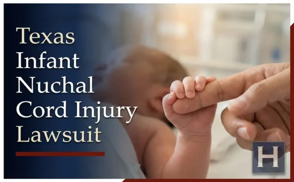 An infant's tiny hand grips an adult's finger in a medical setting, reflecting the care and potential concerns a Texas Infant Nuchal Cord Injury lawyer addresses.