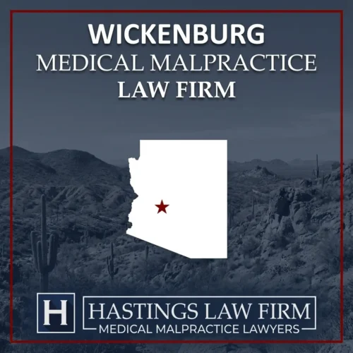 Los mejores abogados especializados en negligencia médica en Wickenburg, Arizona Una vista panorámica de Wickenburg, Arizona. Una estrella roja señala el lugar donde los abogados locales especializados en negligencia médica han ayudado a pacientes lesionados. El logotipo de Hastings Law Firm aparece en la parte inferior.